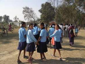 Girls, newly rescued, happily on their way to scho