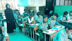 Students writing Formative Examination 4