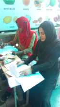 Teachers Evaluating Examination Paper