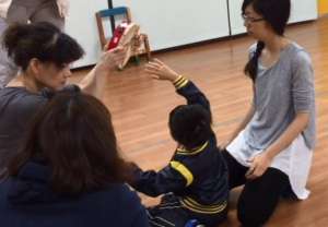 Raising my hand to play a tambourine!