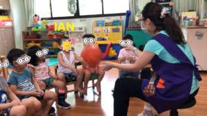 Playing a ball with my teacher.