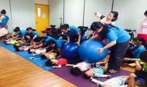 Sensory stimulation through music & stability ball