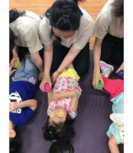 Roll sensory balls downwards towards my arm.