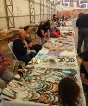 Microentrepreneur women selling products at bazaar