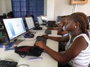 Ladies working on their powerpoint presentations