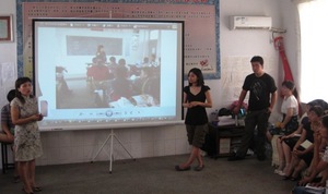 A rural Chinese teacher presents on her teaching.