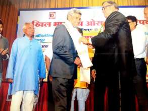 Receiving award from Akhil Bhartiya Oswal Parishad