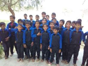 Kids enjoying their new track suits