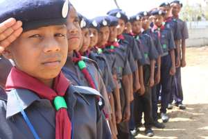 Participating in Boys Scout Camp