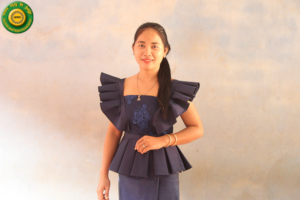 Graduated student with her traditional tops
