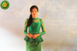 Graduated student with her traditional tops