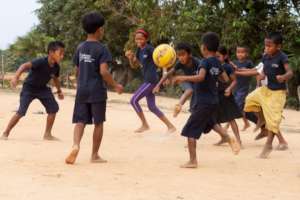 A game of football in sports class.