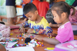 Students engaging in creative hands-on activities