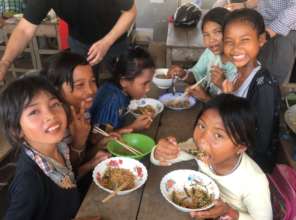 Enjoying their meal at our Khmer New Year party.