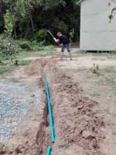 Installing the plumbing for our Water Project