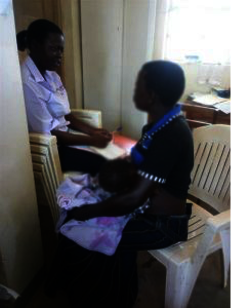 Teddy talks with breastfeeding client before COVID