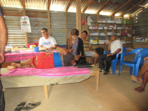 RMF nurse treating an elderly resident