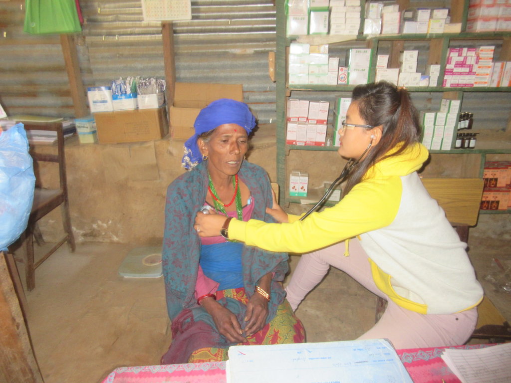RMF Nurse Laxmi examining Purna