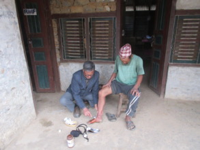 Clinical Officer dressing wound of Rane Baram