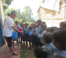 RMF Officer demonstrating handwashing steps