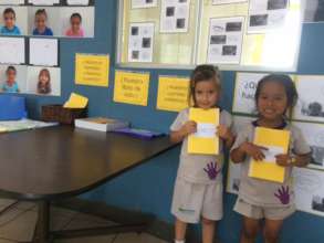 Two girls presented their own books