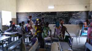 Inside classroom with solar lights, Djomga