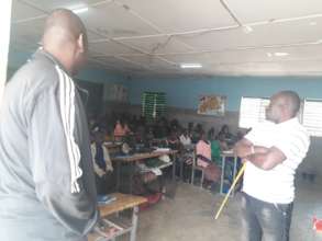 School teachers in classroom with students