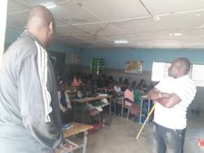 School teachers in classroom with students