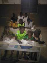 Learners Studying by Solar Light