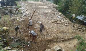 Community members preparing the building site