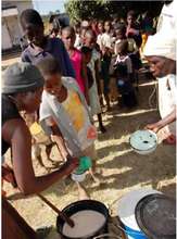 Children recieving porridge