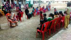 Local women and children playing musical chair