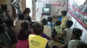 Children watching documentary