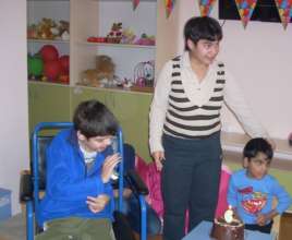 Sashko and his sister at the birthday of a friend