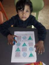 Leo learning shapes and colours.