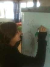 Loredana writing on the board