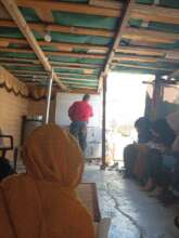 A professor from the community is giving lessons.