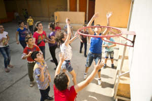 Playing basket ball