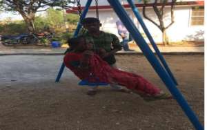 Patient as kid on the swing at hospice