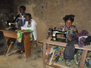 Former child soldiers learn to use sewing machines
