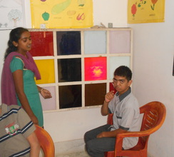 Harshit during a sensory stimulation exercise.JPG