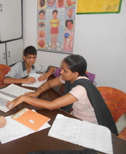 Harshit with his educator.JPG