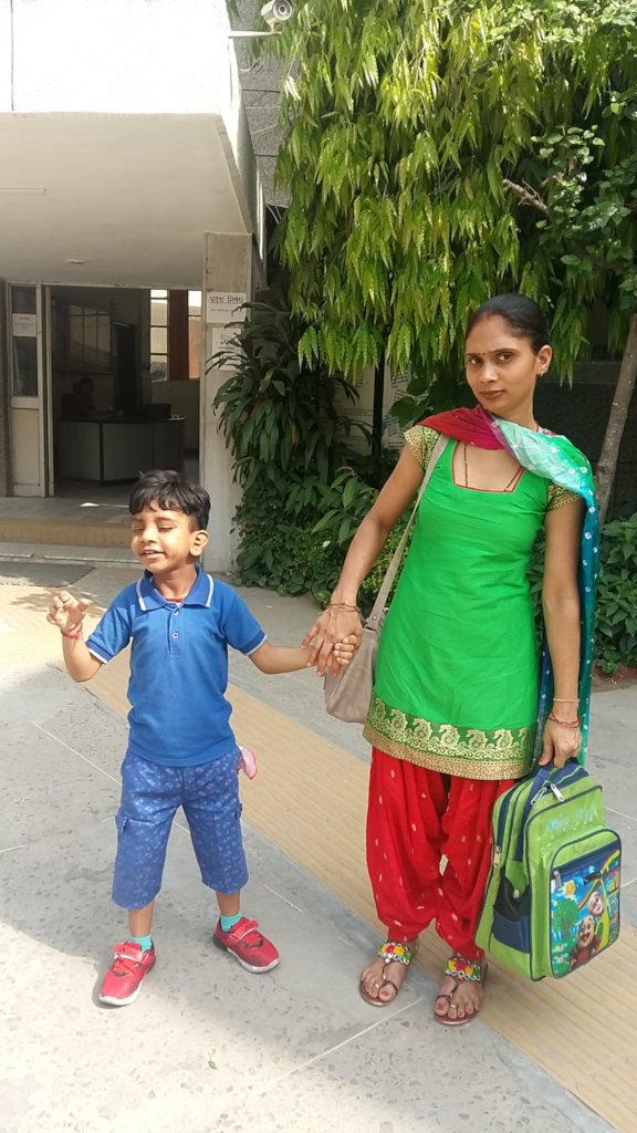 Purav with his mother
