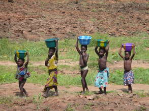 Kids Walking With Buckets