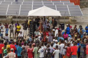 Microgrid Inauguration by the solar panel array.