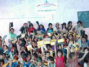 Slum Children Receiving School Shoes at Ashraya