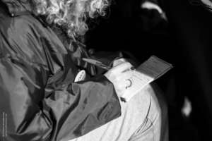 Taking notes of personal needs.