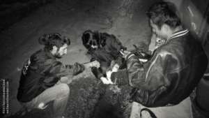 Offering first aid to a homeless young man