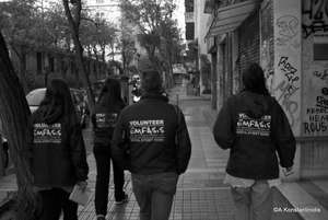 Emfasis Street Workers screen the centre of Athens
