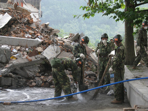 At a tent school on the site of the collapsed middle school